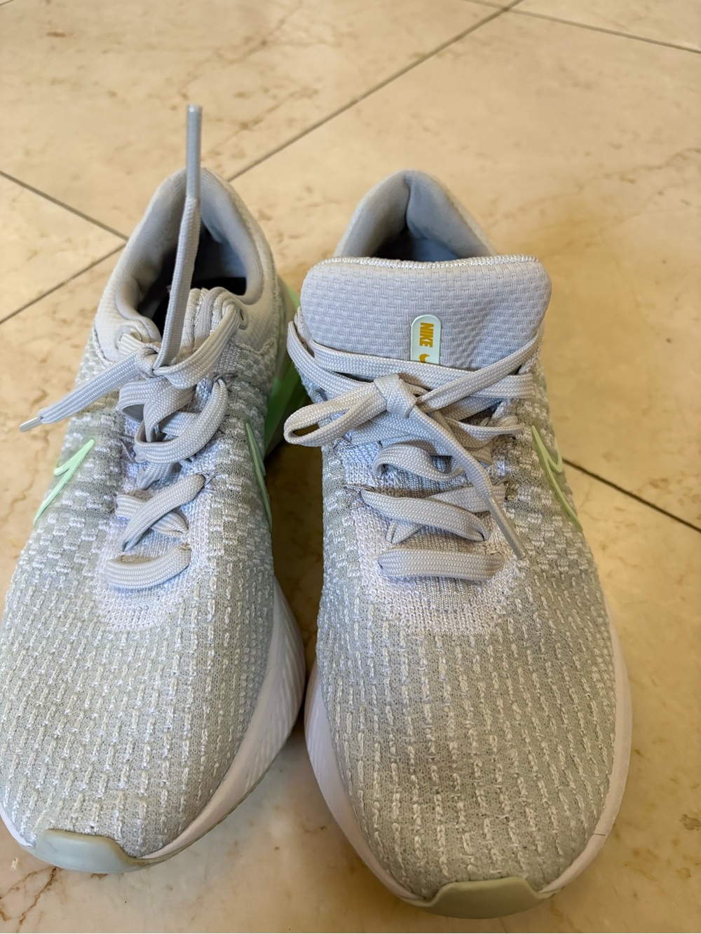 Nike Women’s Light Gray Knit Running Sneakers with Mint Swoosh